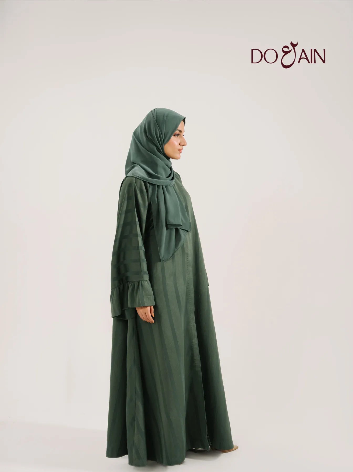 Sorrel by DOAIN – Rich Earth-Toned Abaya with Flowing Elegance