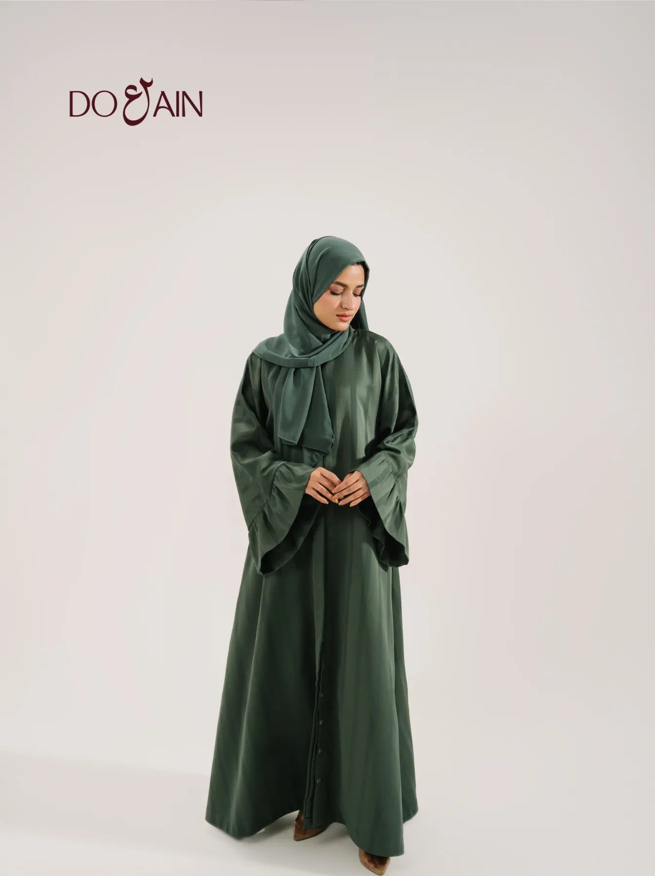 Sorrel by DOAIN – Rich Earth-Toned Abaya with Flowing Elegance