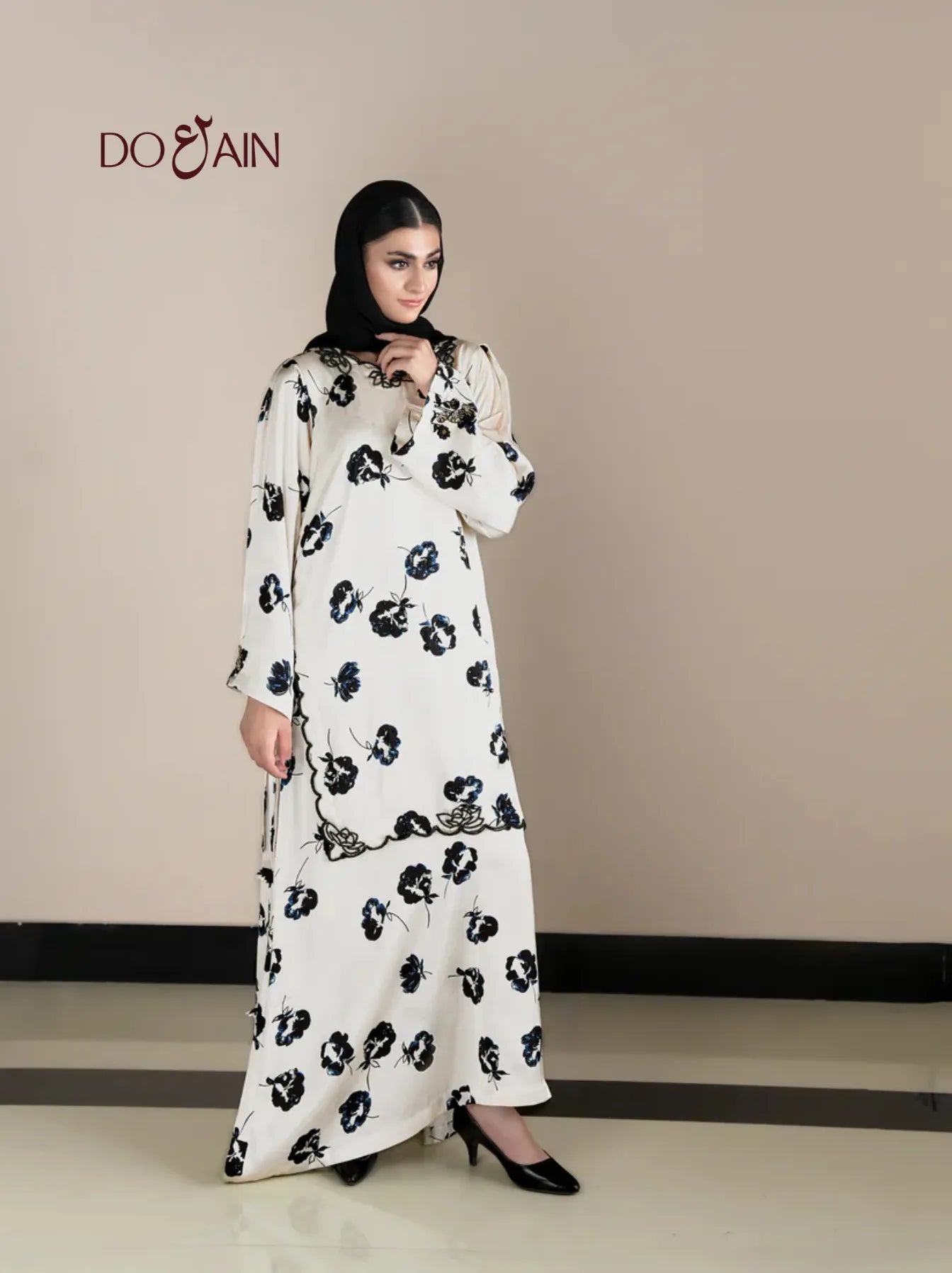 Izel by DOAIN – Elegant Silk One-Piece with Floral Accents