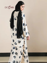 Izel by DOAIN – Elegant Silk One-Piece with Floral Accents