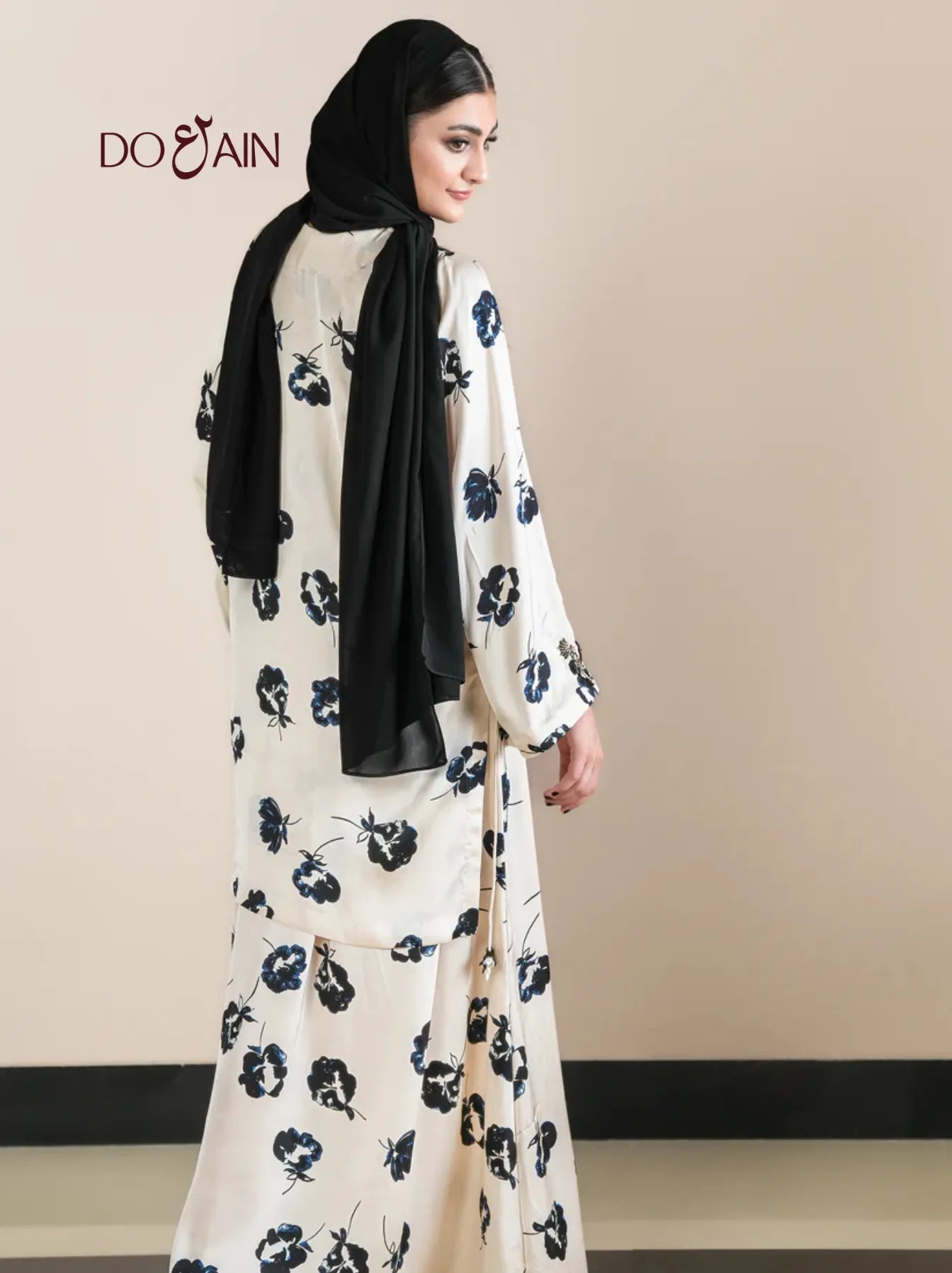 Izel by DOAIN – Elegant Silk One-Piece with Floral Accents